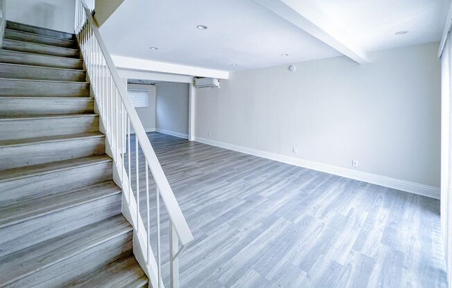 BEAUTIFUL 2 STORY TOWNHOUSE STYLE WITH A/C,  WASHER/DRYER, POOL, AND ONE PARKING SPACE