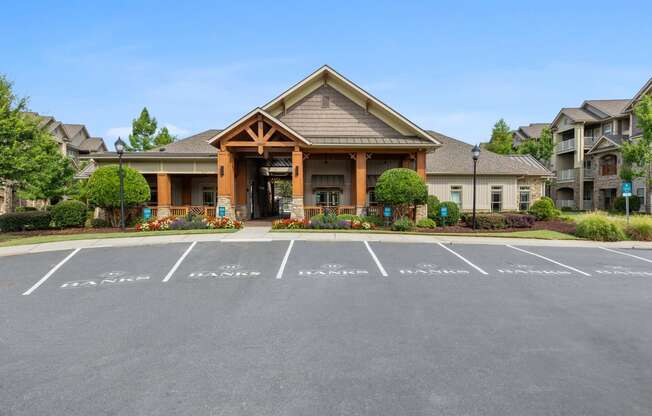 a building with a parking lot in front of it