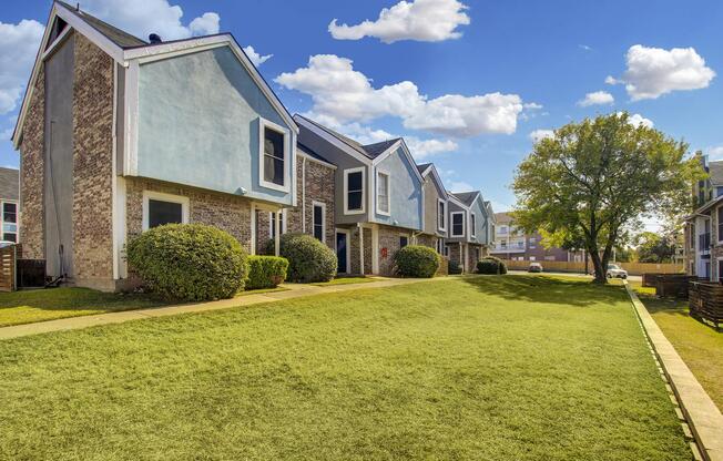 a large lawn in front of a house