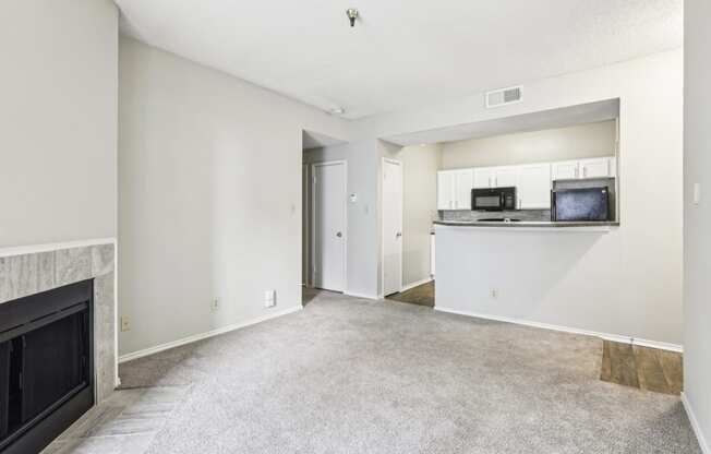 A1 floor plan living room and kitchen at Jefferson Creek Apartments in Irving, TX.