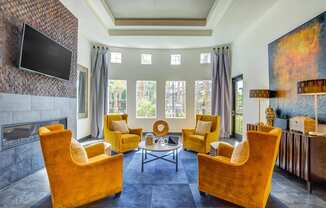 Clubroom with lounge seating and TV