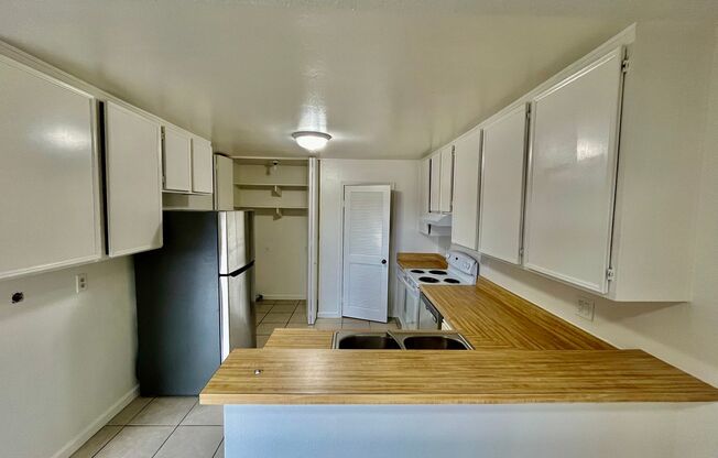 Spacious 2bd/2 bath with private patio in the heart of Paradise Hills.  2 carport spaces