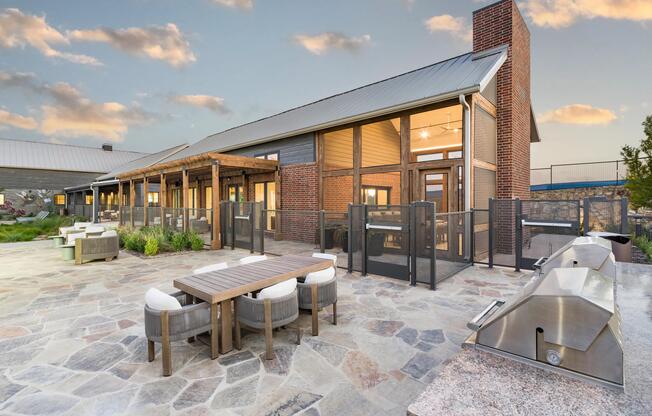 Enjoy relaxed outdoor dining and gathering spaces at Modera McKinney Ridge, perfect for unwinding against scenic Texas sunsets.