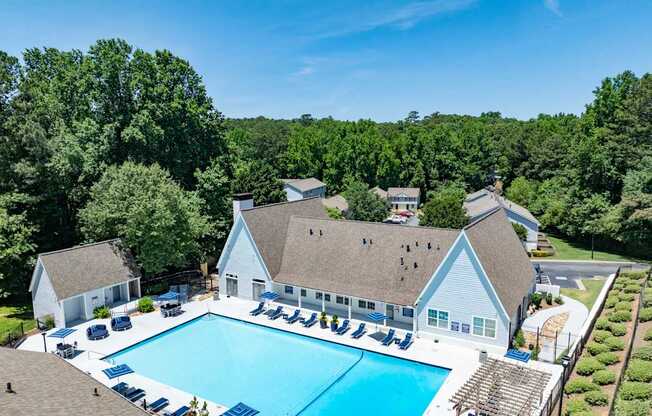 A large white building with a pool at Dunwoody Glen, Atlanta, 30360