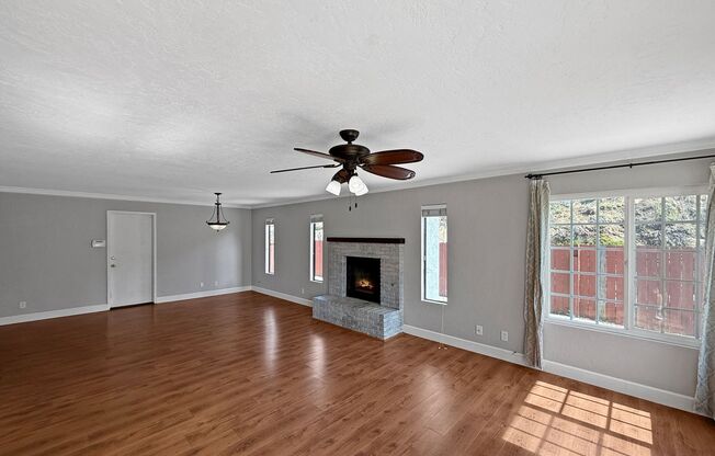 Stunning 4B/2.5Ba House w/ Two Fireplaces, Large Yard, and Attached Garage!