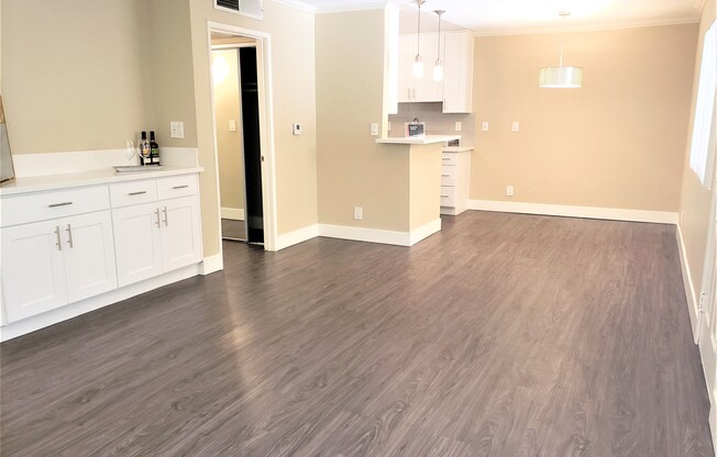 Spacious living room and dining area at the Ebony 2BR/2BA