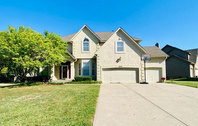 {8514}  Village of Kensington + Finished Basement + 3 Car Garage + Community Pool + Blue Valley Schools!