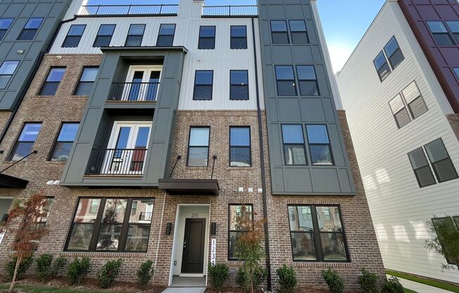 **OFFERING FIRST MONTH'S RENT FREE, $200 MOVE IN PROMOTION & WAIVED APPLICATION FEES** New Construction 3BD, 2.5BA Raleigh Townhome-Style Condo with 1-Car Attached Garage & Rooftop Terrace in Downtown Raleigh