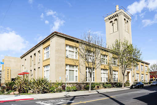 Bakery Lofts exterior ground level view form Adeline and 47th street corner