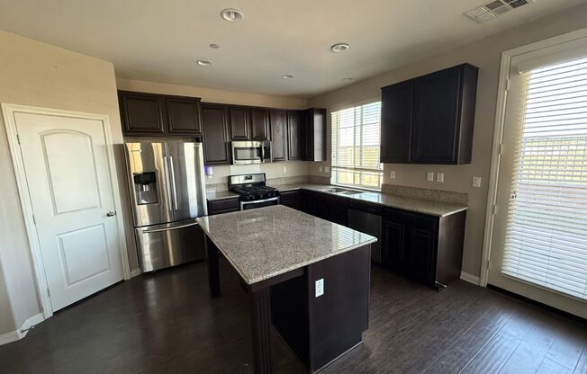 Charming 3BR Home with Modern Kitchen, Versatile Loft, & Private Backyard