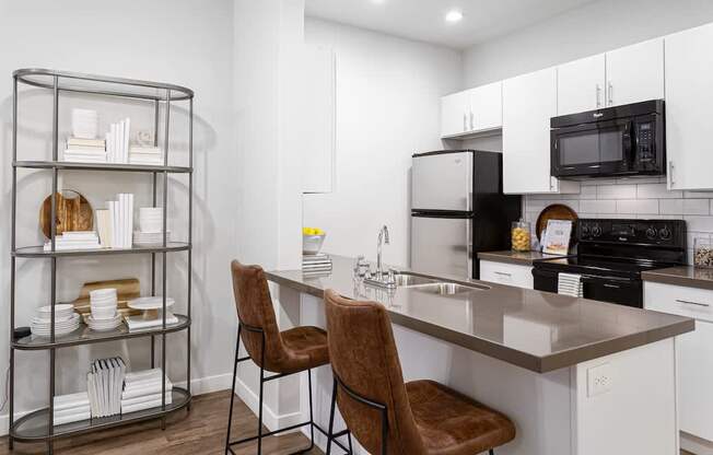 Kitchen with Island in Phase I TH at Parc at Day Dairy