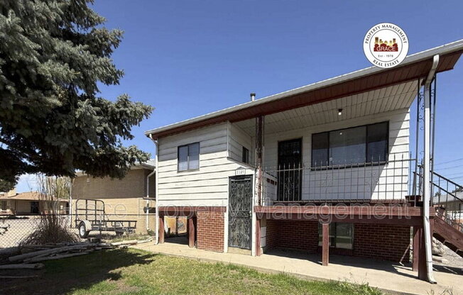 1149 E 58 AVE