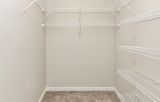 Studio, one two and three bedroom apartments and townhomes featuring open concept floor plans, dens, large windows, stainless steel appliances, quartz countertops, eat-in kitchens, pantries, LVT flooring and much more at The Trails at North Streams in Omaha, NE