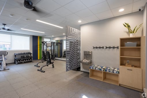 the workout room at the flats at big tex apartments