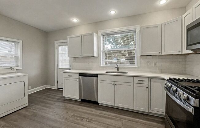 4 Bedroom and 2 Bath House with In-Unit Laundry, Dishwasher, and Off-Street Parking