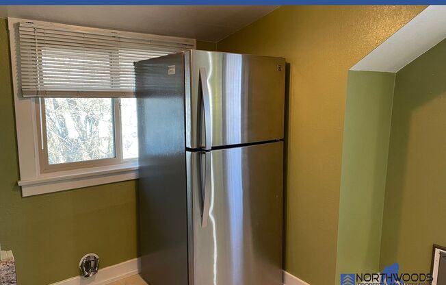 Very Cute 1 bed 1 bath upstairs unit, with separate living room, gated parking with extra storage area