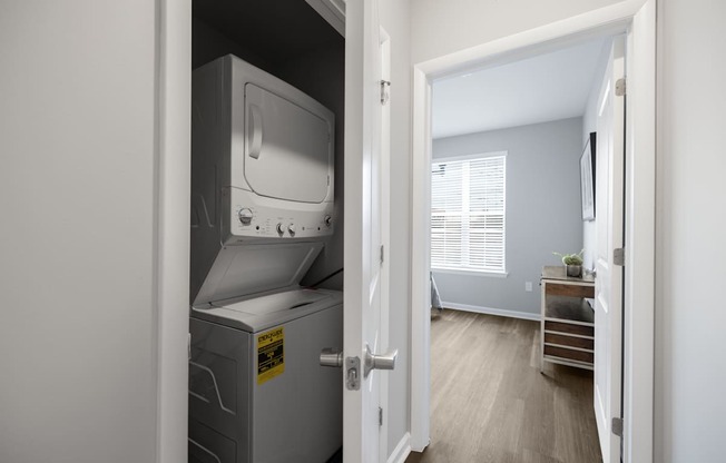 A small room with a refrigerator in it at Harbor Pointe Apartments, Bayonne, New Jersey