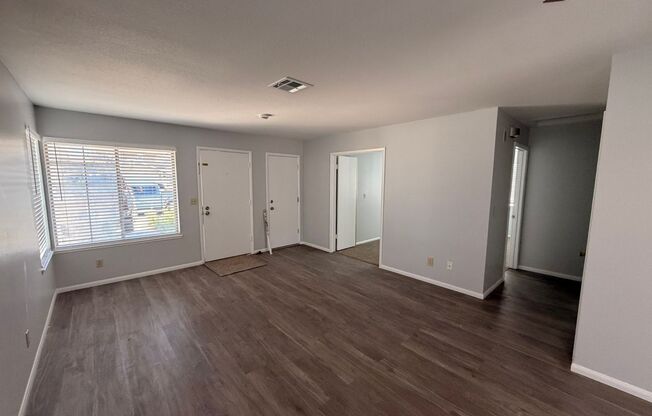 Welcome to this charming single-story home located in the Sunrise Manor!