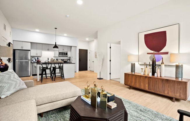 Modern Living Room With Kitchen View at The Hill Apartments, Saint Paul, MN