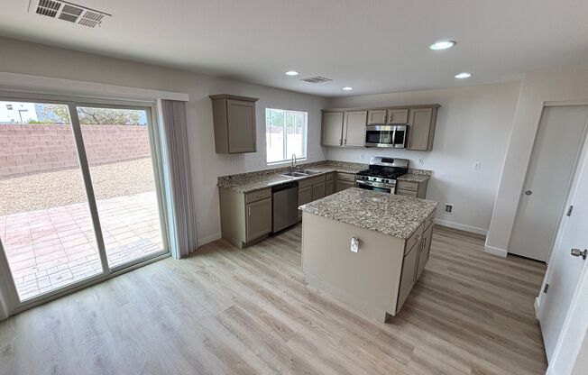 Gorgeous 4Bed/2.5Bath/2Car home located in North Las Vegas Raven Hill gated community!