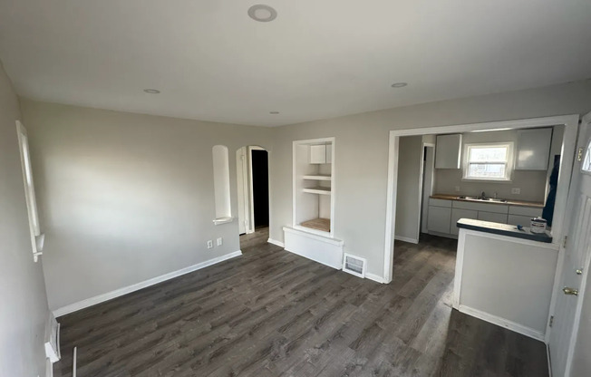 2 bed 1 bath recently refinished corner home with new kitchen, bathroom, and floors!