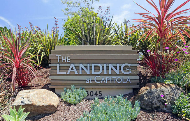 a sign at the landing at capitol commons