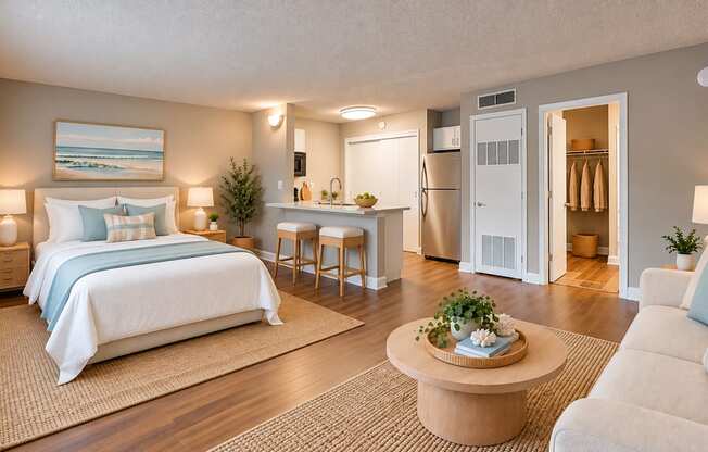 Alternate view of a virtually staged studio with coastal furnishings at Waterchase Apartments in Largo, FL.
