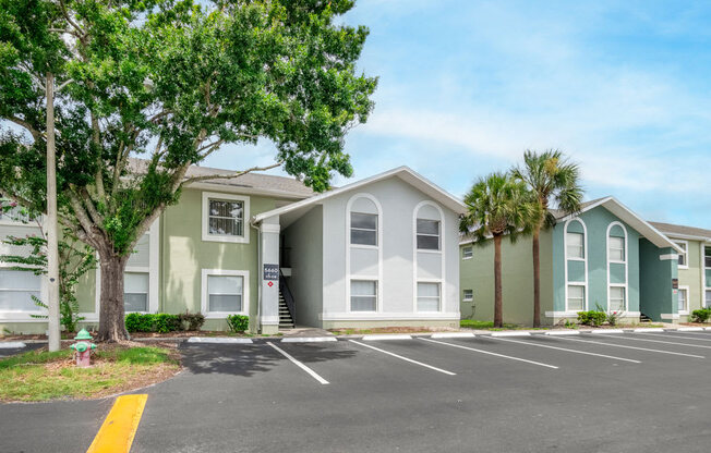 Exterior of apartment buildings with parking lot_Rolling Hills Apartments