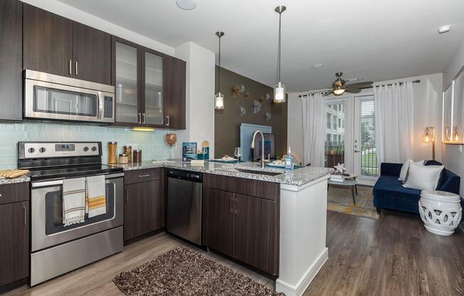 a large kitchen with stainless steel appliances