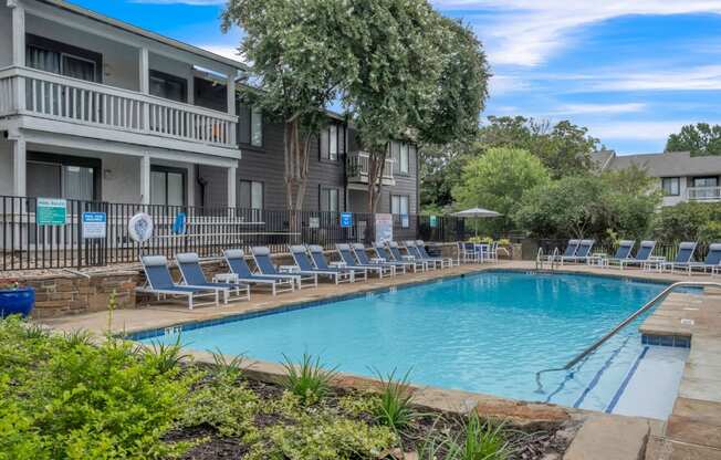 our apartments have a large swimming pool and lounge chairs