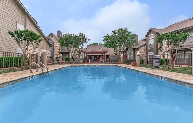 a house with a large pool of water