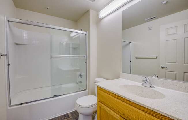 a bathroom with a toilet sink and shower  at Seville at Gale Ranch, San Ramon, CA