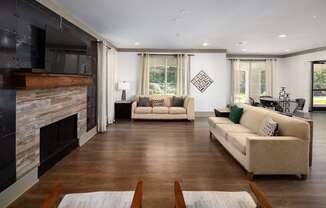 Resident Clubhouse with seating and a tv