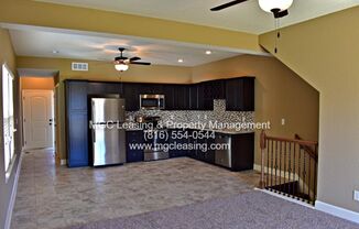 EAGLE CREEK TOWNHOME WITH GARAGE, DECK AND UNFINISHED BASEMENT!