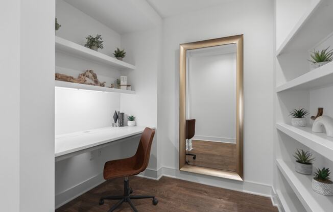 a doorway into a home office with a desk and chair  at Stanza Little Italy, San Diego, CA