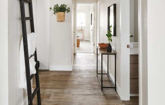 a view of the hallway in a 555 waverly unit with hardwood floors and a