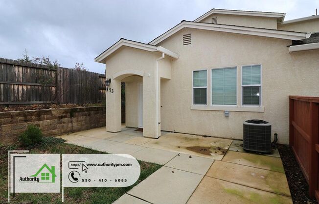 573 Mission De Oro -   End Unit with a fenced front yard.