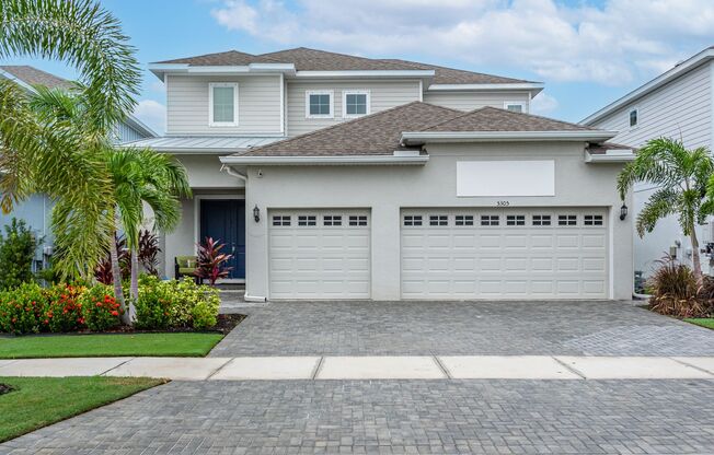 4 Bedroom 3.5 Bath Waterfront  Pool Home in Gated Community