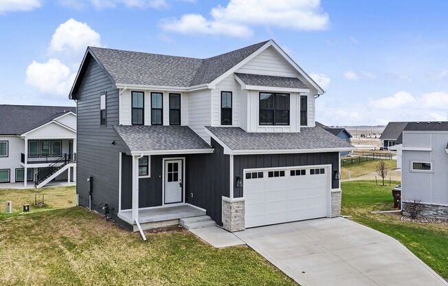 Spacious 4-Bedroom Home with 2-Car Garage & Yard