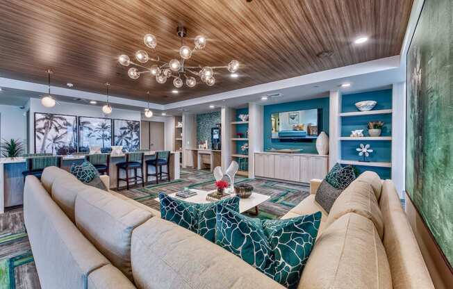 A living room with a large couch and a coffee table.