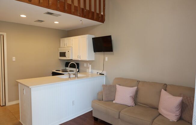 PEARL WEST CAMPUS - LOFTED 2BD / 1 BA - GATED - COVERED PARKING - WATER PAID