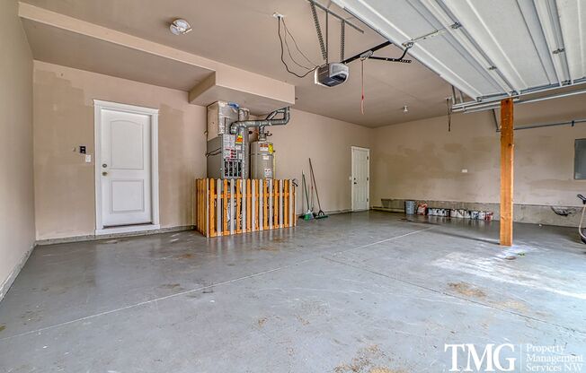 Beautiful 4br/2.5ba home with 3 car garage, deck, AC and more!
