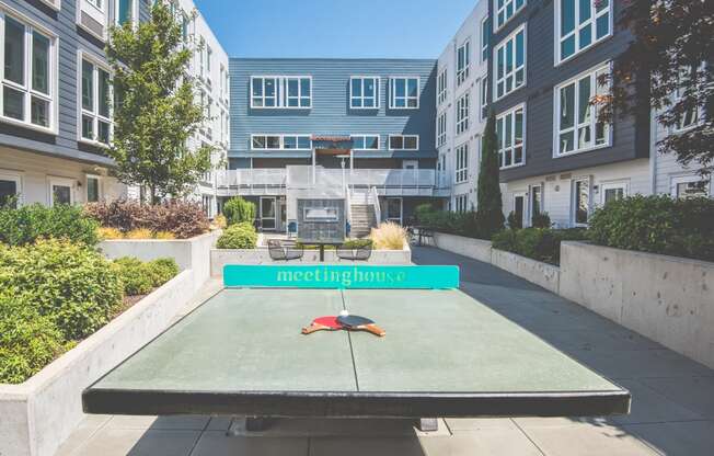 Meetinghouse Apartments Outdoor Courtyard and Ping Pong Table