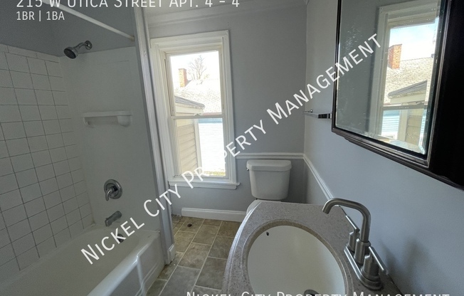 215 W UTICA ST