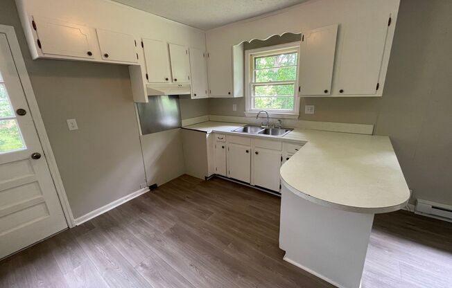 3 bedroom 1 bath brick ranch house.    Freshly Painted- New Flooring
