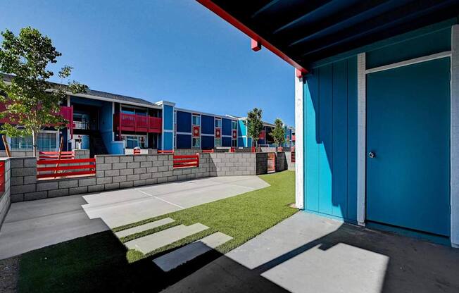 A blue door is on the right side of the image.