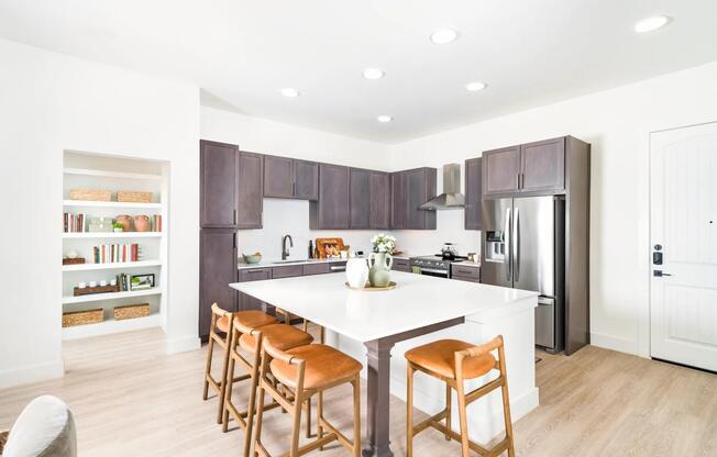 Gather with ease in Modera Trailhead’s gourmet kitchens, featuring expansive islands, sleek cabinetry, and stainless-steel appliances.