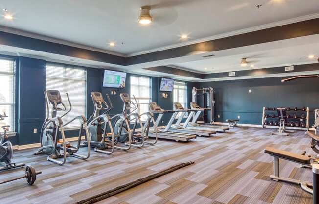 fitness center at Crossroads Station Luxury Apartments