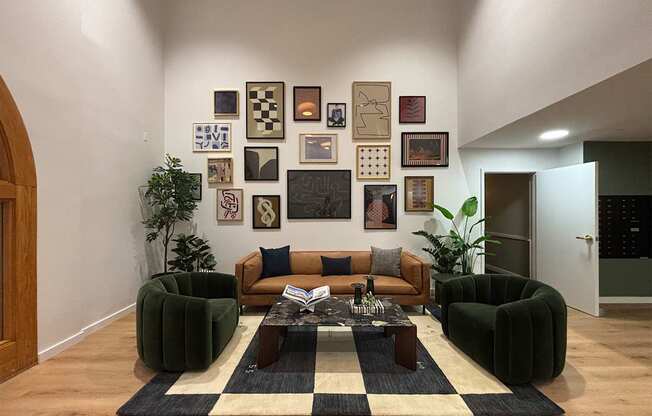 A living room with a brown sofa and a coffee table with a black and white rug.