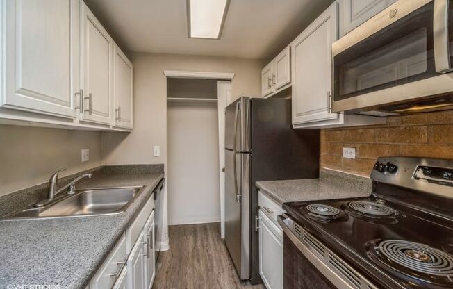 Stainless steel appliances with a built in microwave